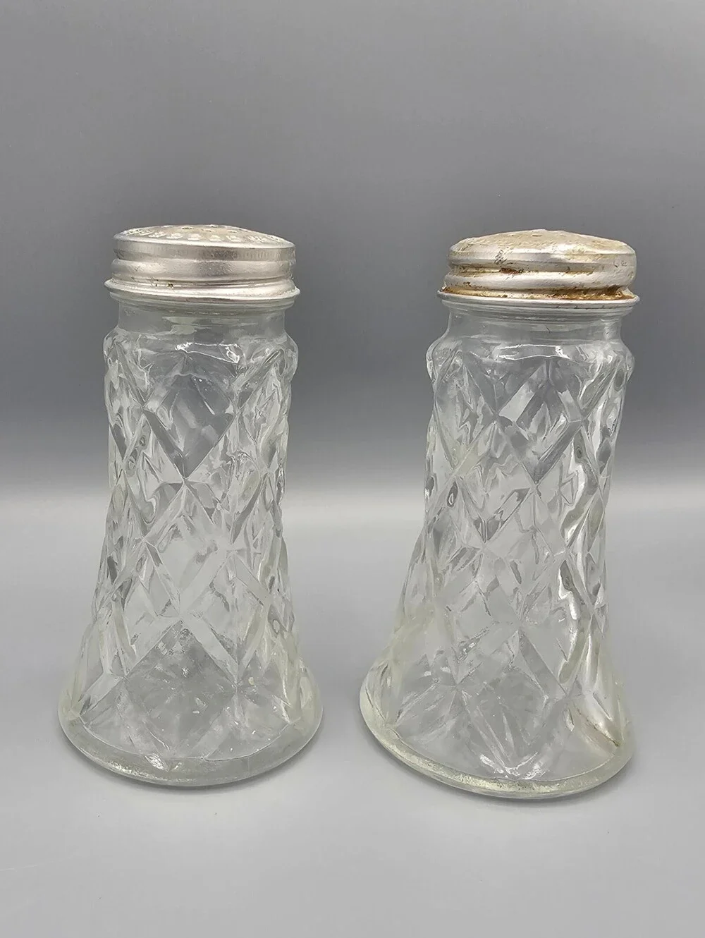 Vintage Glass Salt and Pepper Shakers with Silver-Tone Metal Caps